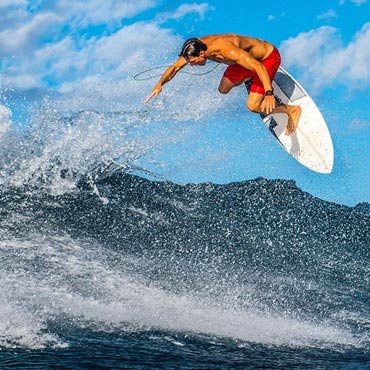 Kody surfing the Maui waves